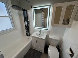 Spacious Retreat Near Convention Centers 4 Bedroom Home by RedAwning