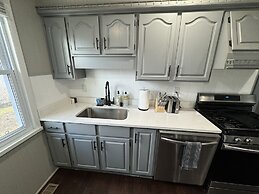 Spacious Retreat Near Convention Centers 4 Bedroom Home by RedAwning