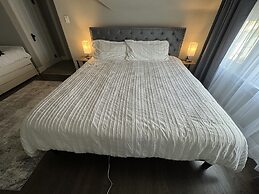 Spacious Retreat Near Convention Centers 4 Bedroom Home by RedAwning