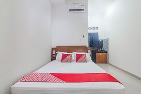 OYO 93691 Minongga Near One Belpark Mall