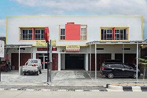 OYO 93695 Guest House Riharti Syariah