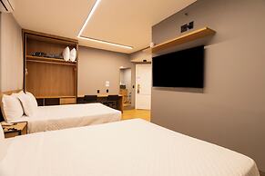 You Stay at Vila Olimpia - The World