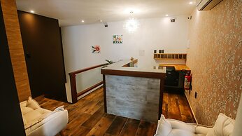 Pousada Flores da Praça