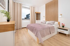 Apartment Manufaktura Łódź by Renters