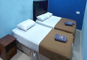 OYO 90937 Tanjak Hotel