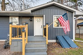 Riverfront Michigan Cottage w/ Fire Pit & Kayaks!