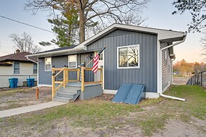 Riverfront Michigan Cottage w/ Fire Pit & Kayaks!