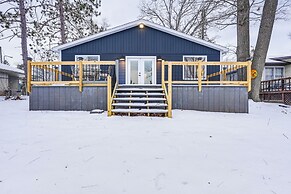 Riverfront Michigan Cottage w/ Fire Pit & Kayaks!