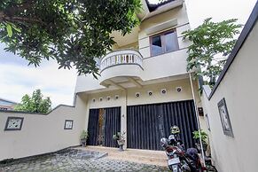 Capital O 93716 Family Guesthouse Syariah