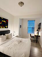 Cherry Suites 2BR Apt w W D Arcade Machine