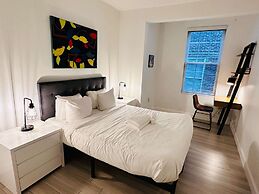 Cherry Suites 2BR Apt w W D Arcade Machine