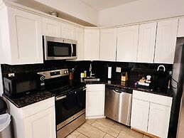 Cherry Suites 2BR Apt w W D Arcade Machine