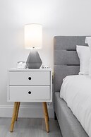 Cherry Suites 2BR Apt w W D Arcade Machine