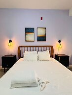 Cherry Suites 2BR Apt w W D Arcade Machine