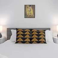 Cherry Suites 2BR Apt w W D Arcade Machine