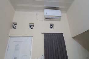 OYO 93768 Setia Budi Guest House 1