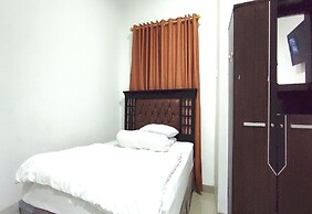 OYO 93768 Setia Budi Guest House 1