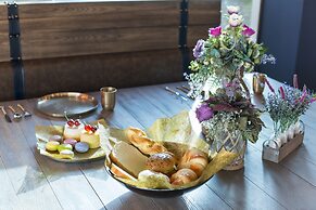 Woods The Clubhouse - Mangalyam Meadows