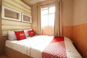 OYO 93746 The Metro Suites Apartment By Yusuf