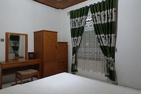 OYO 93706 Penginapan Syariah Hj. Kenan