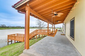 Lakefront Gem on 32-acre Lot in Angleton!