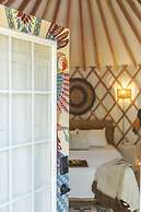 The Macaw Yurt at Camposanto ATX Glamping on Lake Travis