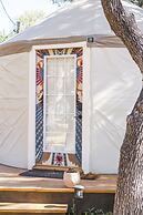 The Macaw Yurt at Camposanto ATX Glamping on Lake Travis