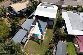 Rosewood Rustic Refuge Pool Outdoor Dining Backyard