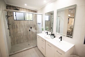 Rosewood Rustic Refuge Pool Outdoor Dining Backyard