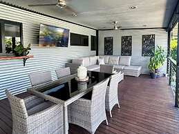 Rosewood Rustic Refuge Pool Outdoor Dining Backyard