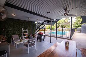 Rosewood Rustic Refuge Pool Outdoor Dining Backyard