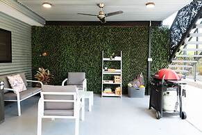 Rosewood Rustic Refuge Pool Outdoor Dining Backyard