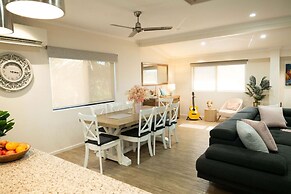 Rosewood Rustic Refuge Pool Outdoor Dining Backyard