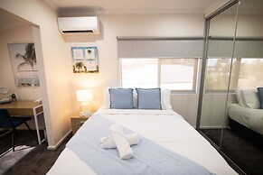 Rosewood Rustic Refuge Pool Outdoor Dining Backyard