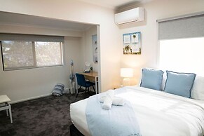 Rosewood Rustic Refuge Pool Outdoor Dining Backyard