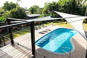 Rosewood Rustic Refuge Pool Outdoor Dining Backyard