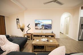 Rosewood Rustic Refuge Pool Outdoor Dining Backyard