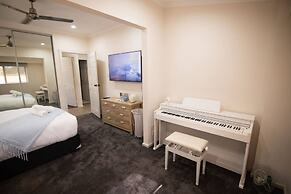 Rosewood Rustic Refuge Pool Outdoor Dining Backyard