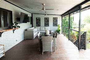 Rosewood Rustic Refuge Pool Outdoor Dining Backyard