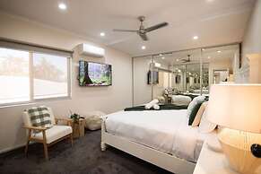 Rosewood Rustic Refuge Pool Outdoor Dining Backyard