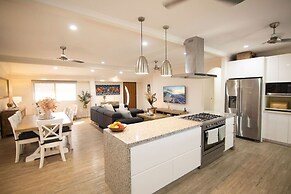 Rosewood Rustic Refuge Pool Outdoor Dining Backyard