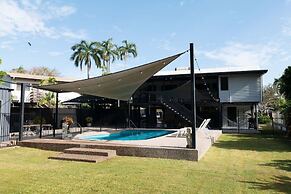 Rosewood Rustic Refuge Pool Outdoor Dining Backyard