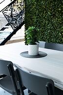 Rosewood Rustic Refuge Pool Outdoor Dining Backyard