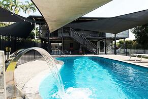 Rosewood Rustic Refuge Pool Outdoor Dining Backyard