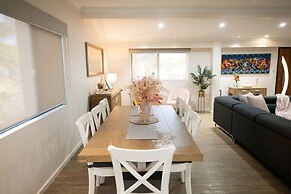 Rosewood Rustic Refuge Pool Outdoor Dining Backyard