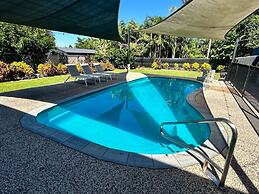 Rosewood Rustic Refuge Pool Outdoor Dining Backyard