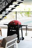 Rosewood Rustic Refuge Pool Outdoor Dining Backyard