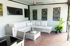 Rosewood Rustic Refuge Pool Outdoor Dining Backyard