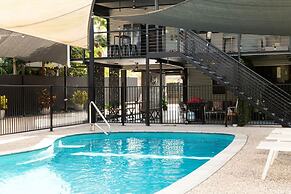 Rosewood Rustic Refuge Pool Outdoor Dining Backyard