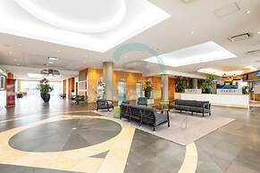 Coastal Elegance Sunset Pool Balcony Dining